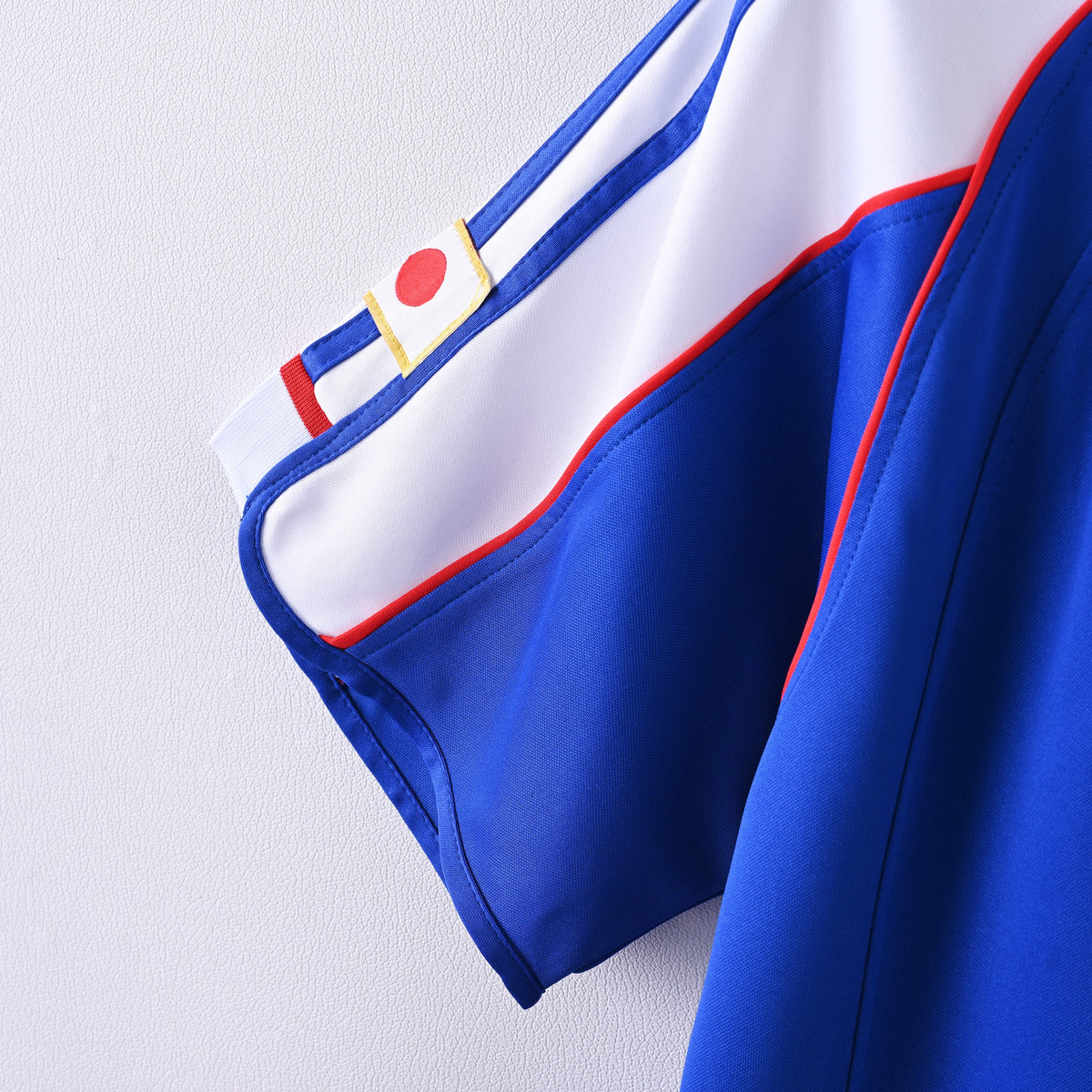 Japan 2000 home retro jersey, detalle de mangas y tejido